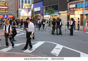 stock-photo-tokyo-japan-june-a-group-of-male-hosts-are-looking-for-potential-clients-in-kabukicho-162415220 2